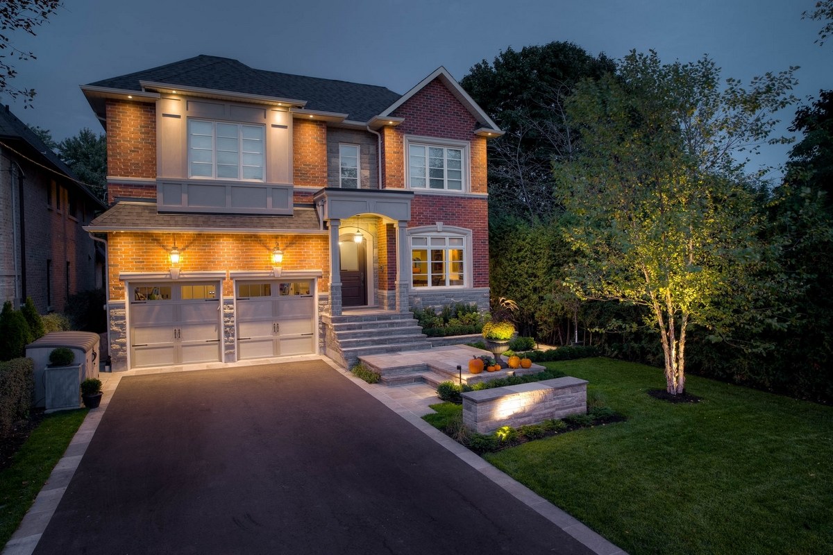 Architectural landscape lighting on a Toronto home at dusk